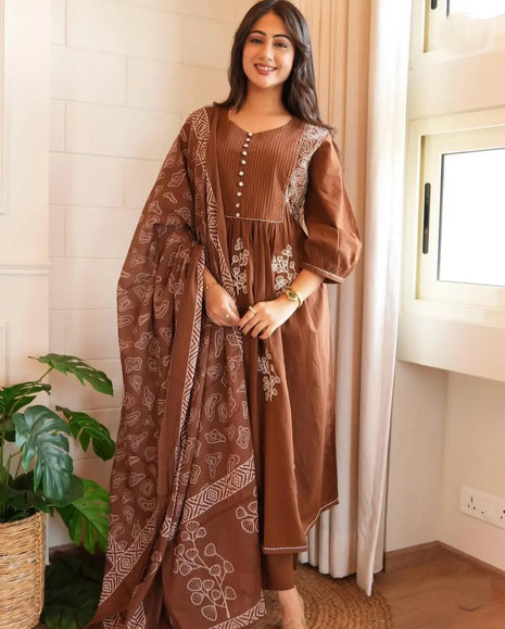 Model twirling flared cotton Anarkali suit with dupatta


