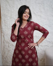 Woman wearing heavy cotton kurti pant set with pockets, front view

