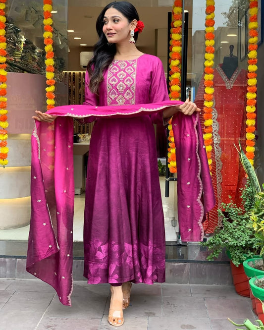Front view of muslin silk suit with zari embroidery

