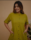 Full outfit laid flat showing kurta and pants

