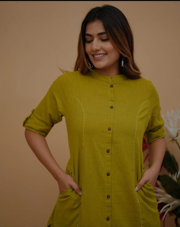 Full outfit laid flat showing kurta and pants

