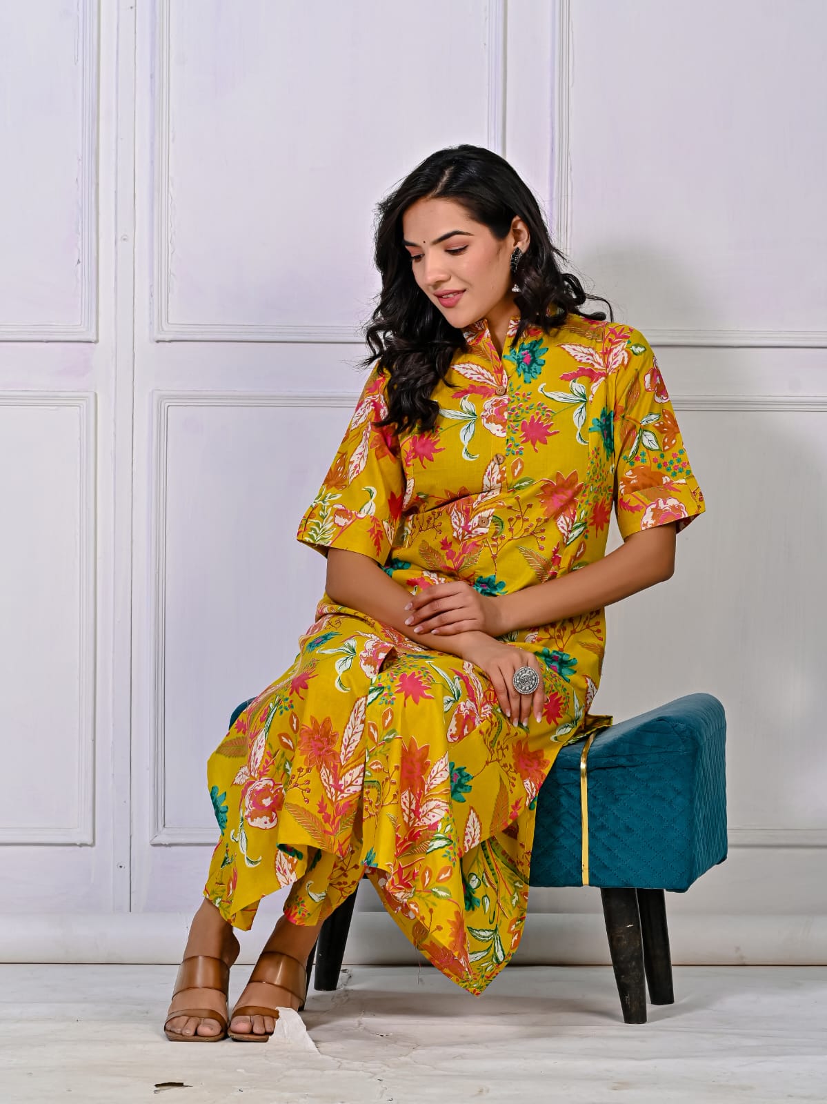 Front view of floral A-line cotton kurti with ankle-length pant set

