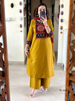 Complete set with kurti, pants, and malmal dupatta elegantly displayed

