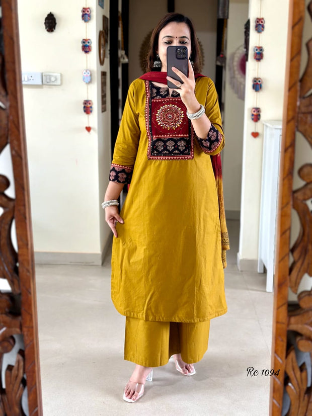 Complete set with kurti, pants, and malmal dupatta elegantly displayed

