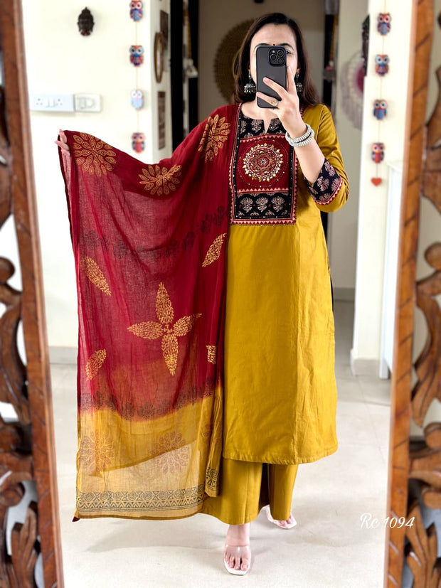 Mustard embroidered cotton suit set with a beautifully detailed yoke

