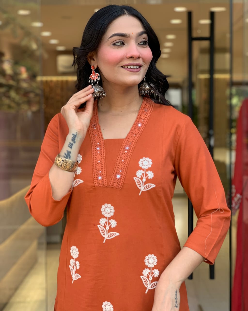 Malmal dupatta with print and lace on orange suit set

