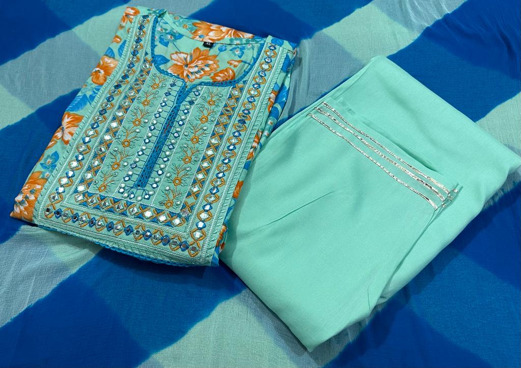 Maabetii Teal Blue Floral Embroider Naira Cut Rayon Silk Suit Set