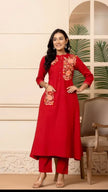 Front view of embroidered A-line cotton kurti with pant

