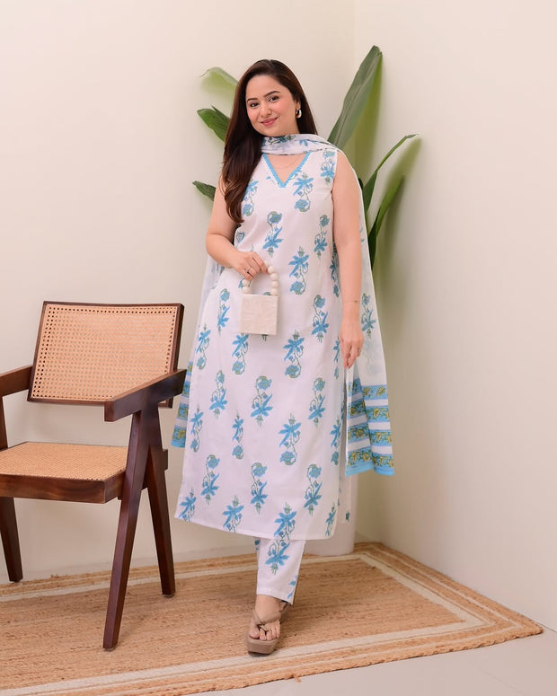 Front view of handblock printed cotton suit with lace neck work

