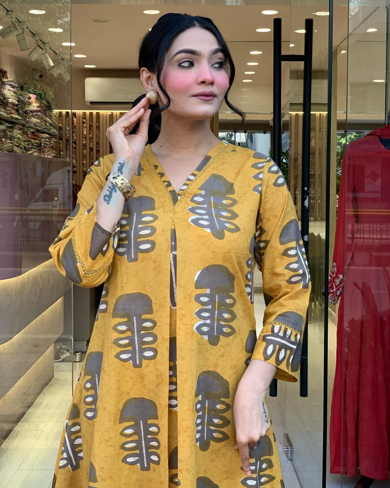 Close-up of floral print on kurta and pant

