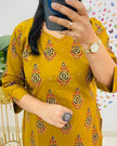 Full set of kurti, pant, and dupatta – flatlay

