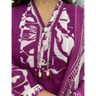 Close-up of embroidery on neckline and floral sleeves

