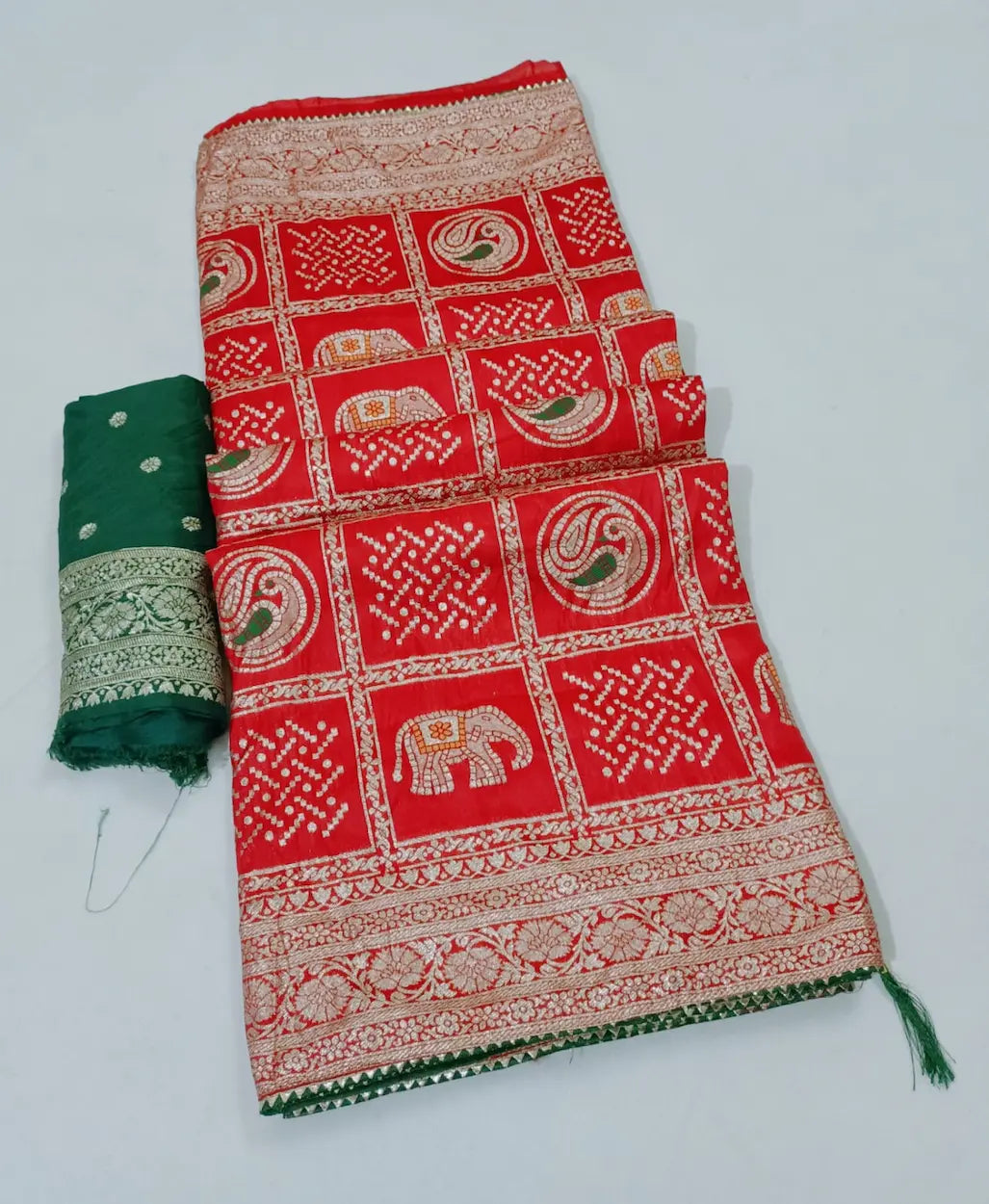 Zari Bandhej saree in Russian Dola fabric with contrast buti blouse

